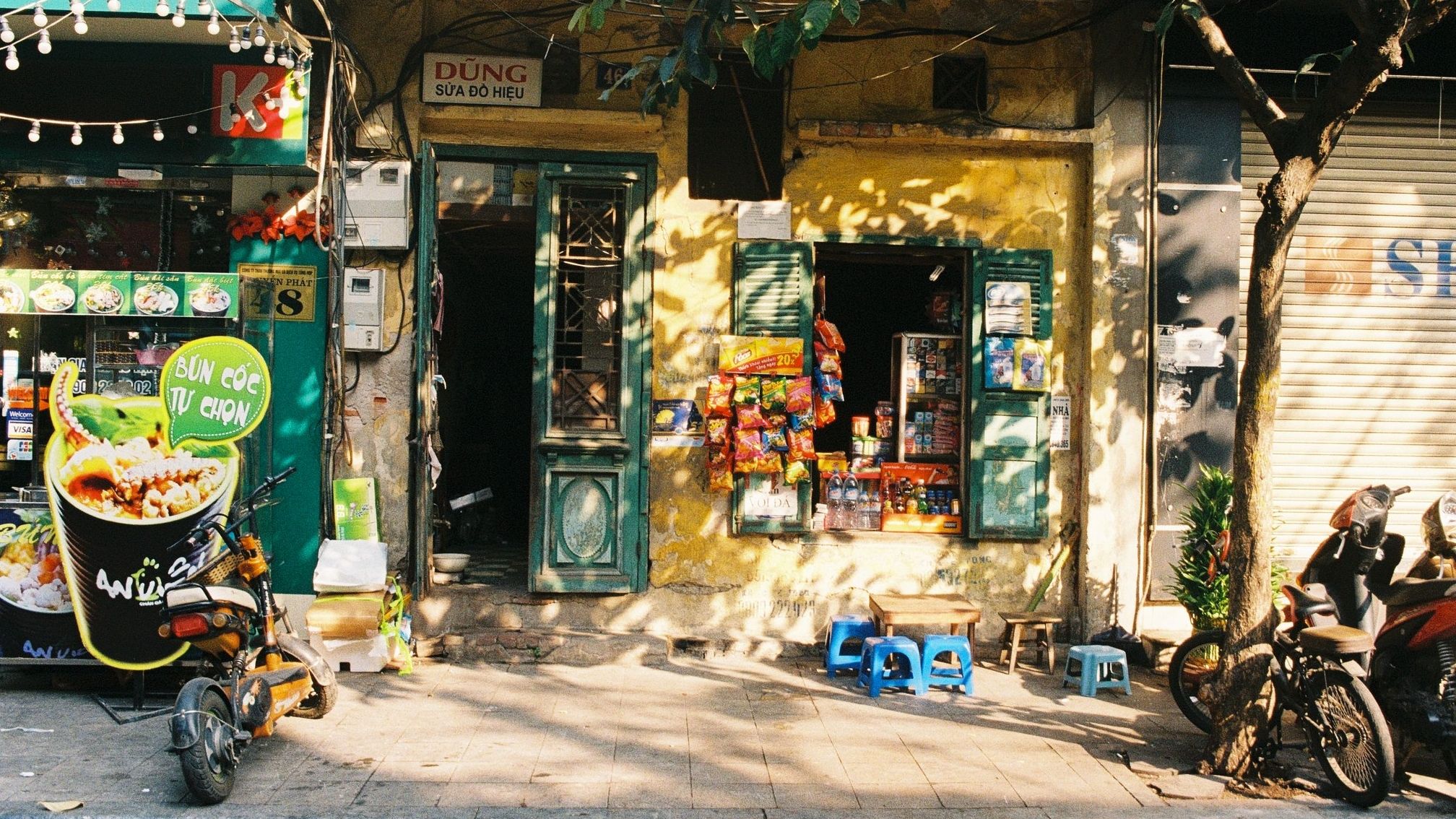 shop on sidewalk in the old quarter of Hanoi, vietnam