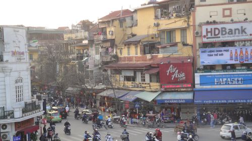 Hanoi old quarter with many motorbikes